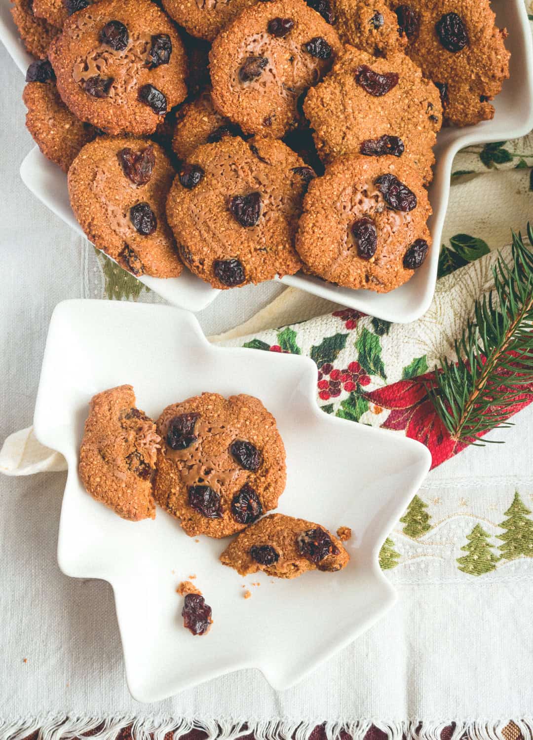 Cranberry Oat Cookies - crispy on the edges, chewy in the middle. These gingerbread flavored cookies are absolutely scrumptious! Our favorite Christmas recipe! | thehealthfulideas.com