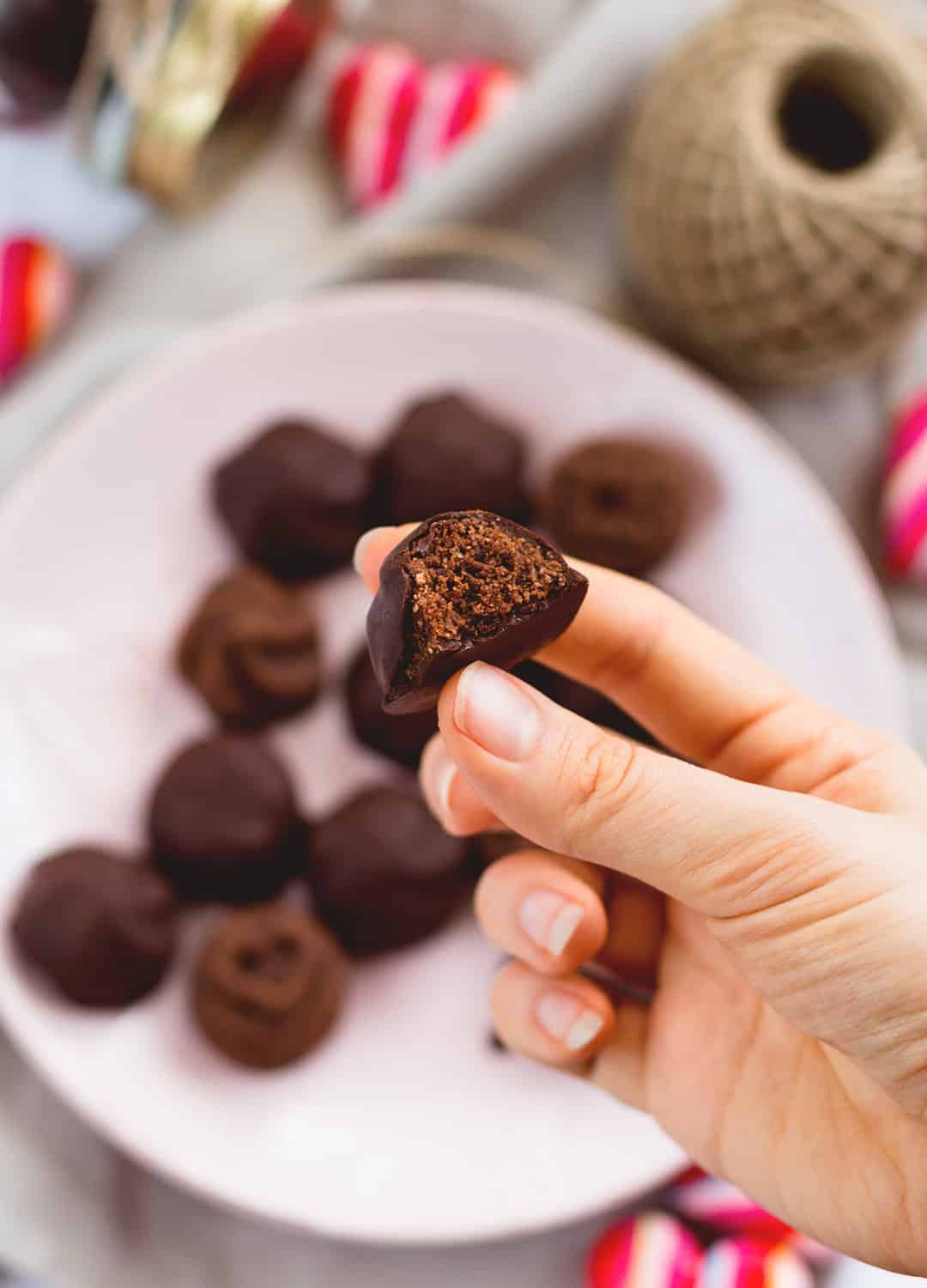 Raw Chocolate Covered Cookies - vegan and delicious, these chocolatey cookies are actually healthy! Great for Valentine's Day or any other day of the week when you're craving something sweet! Store them in the fridge or in the freezer. | thehealthfulideas.com