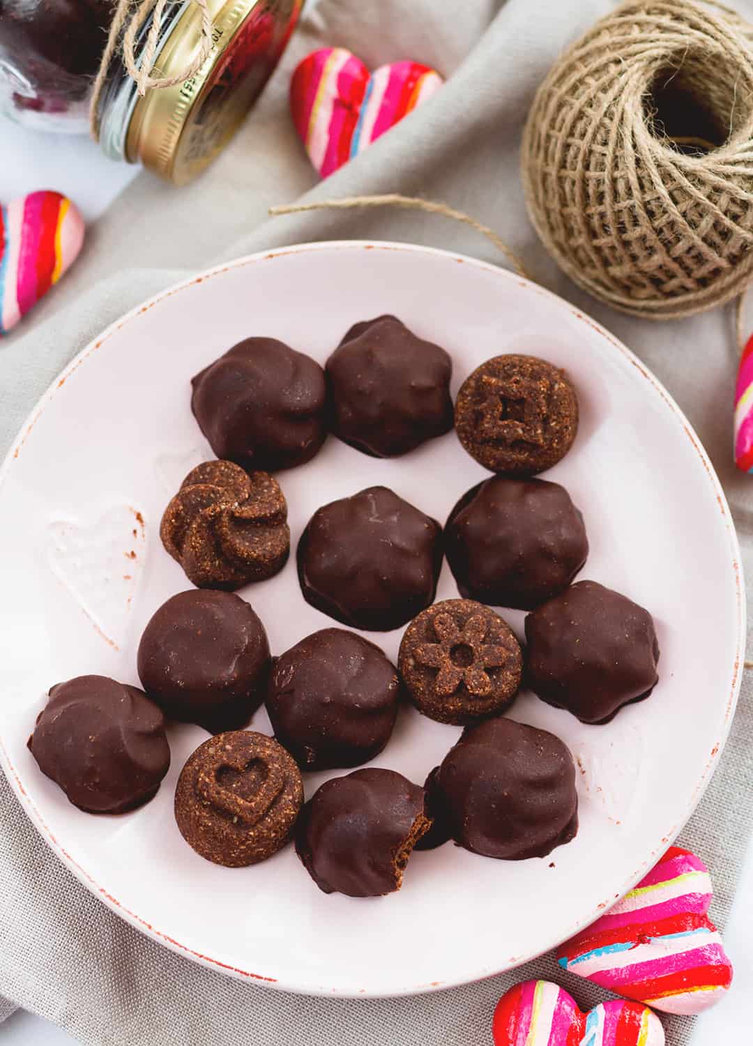 Raw Chocolate Covered Cookies - vegan and delicious, these chocolatey cookies are actually healthy! Great for Valentine's Day or any other day of the week when you're craving something sweet! Store them in the fridge or in the freezer. | thehealthfulideas.com