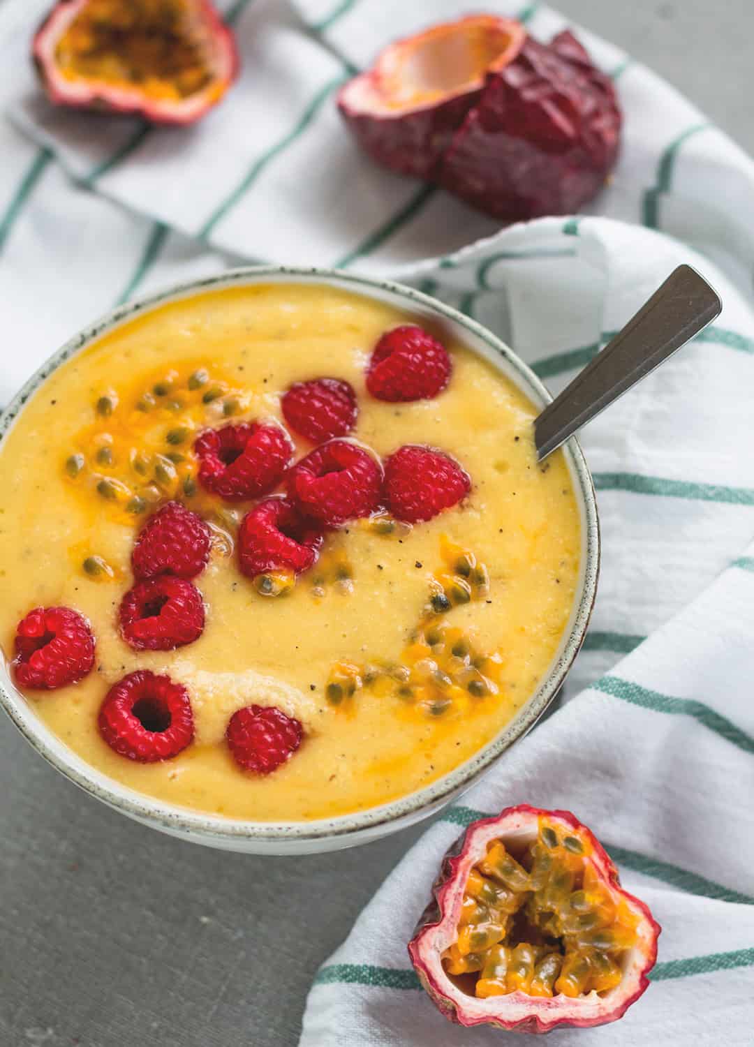 Tangy Baobab Sunshine Smoothie - the perfect summer smoothie! I love this recipe, it's easy, delicious, and filling. Baobab, mango, pineapple, passion fruit, and turmeric. So GOOD! | thehealthfulideas.com