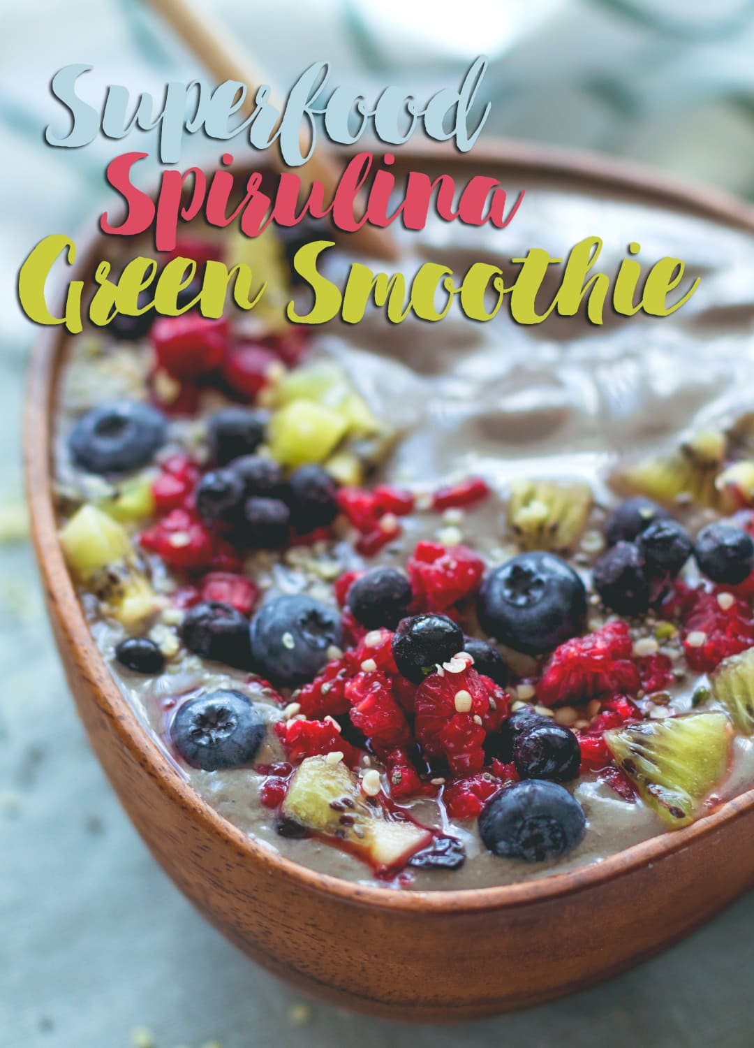 Superfood Spirulina Green Smoothie - banana, mango, raspberries, strawberries, coconut water and amazing protein packed spirulina powder. You'll love this smoothie! Easy to make, really tasty, and packed with nutrients! | thehealthfulideas.com