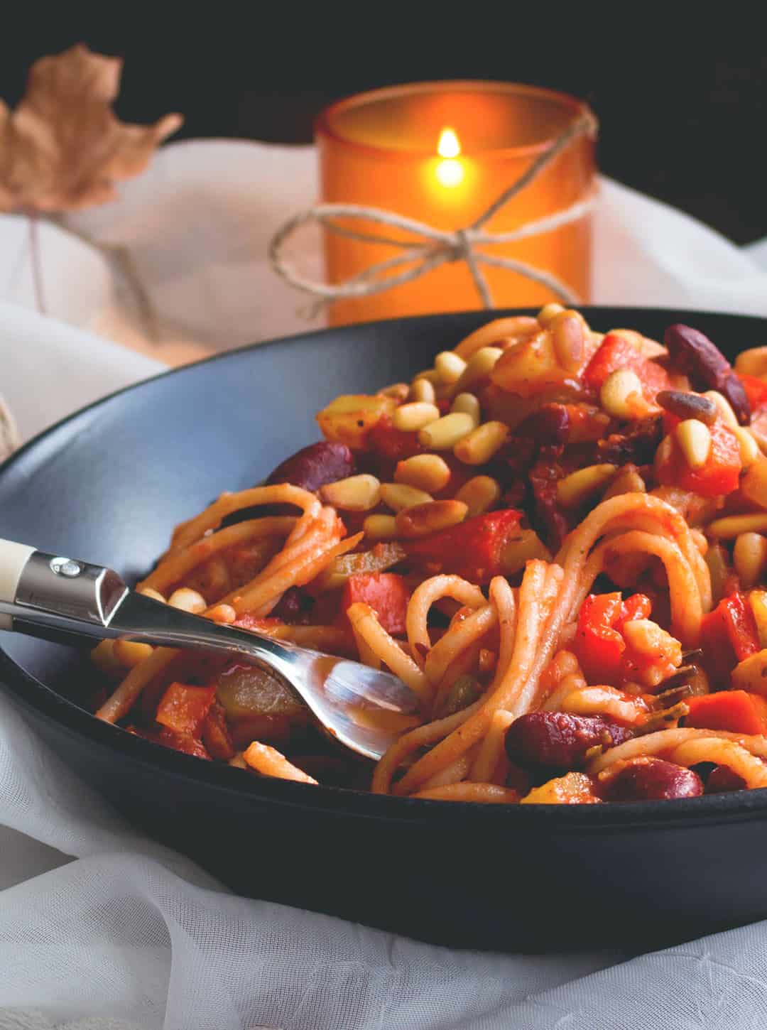 Tomato Spaghetti with Vegetables and Pine Nuts. Vegan & GF made with brown rice pasta, veggies, beans, pine nuts, and tomato sauce. Easy, delicious and really comforting. YUM! | thehealthfulideas.com