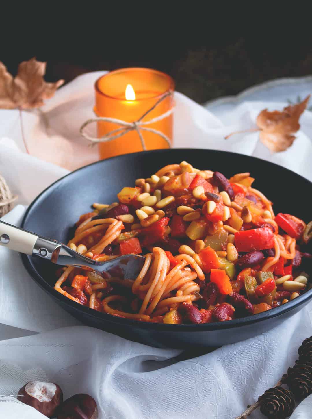 Tomato Spaghetti with Vegetables and Pine Nuts. Vegan & GF made with brown rice pasta, veggies, beans, pine nuts, and tomato sauce. Easy, delicious and really comforting. YUM! | thehealthfulideas.com