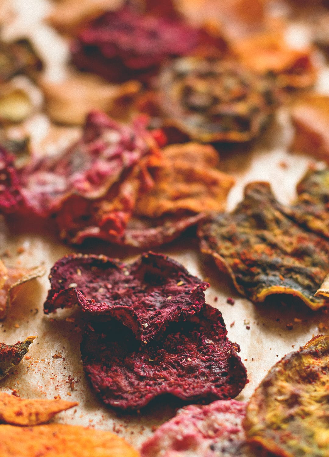 Oven Baked Veggie Chips - red, yellow, and pink beets, sweet potatoes, and some regular potatoes is all you need! Plus your favorite seasoning. You'll absolutely love these. Crunchy & delicious. | thehealthfulideas.com