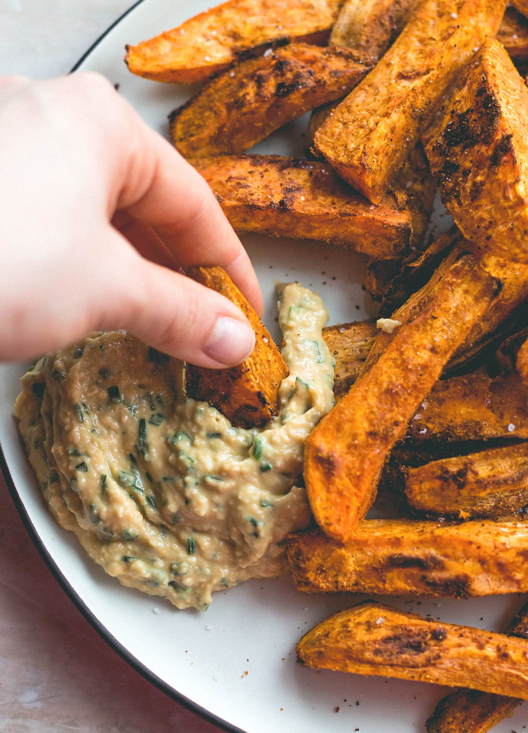 Tandoori Masala Sweet Potato Wedges (vegan, GF) - over roasted sweet potato fries with amazing spices, and a touch of coconut oil. Easy to make, delicious, and totally guilt-free. You'll love this recipe! | thehealthfulideas.com