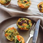 Healthy Breakfast Cheesy Egg Muffins - easy breakfast you can make ahead and eat on the go! Keep them in the fridge and add one or two to your salad for more protein! Delicious and cheesy muffins without the use of cheese - these are dairy free! | thehealthfulideas.com