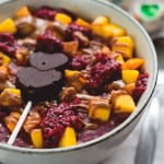 Pink Raspberry Acai Oatmeal is my new favorite breakfast! What day of the week would you say no to a bowl of delicious pink oatmeal? It's hearty, creamy, satisfying, and amazing for brightening a cold gloomy morning! | thehealthfulideas.com