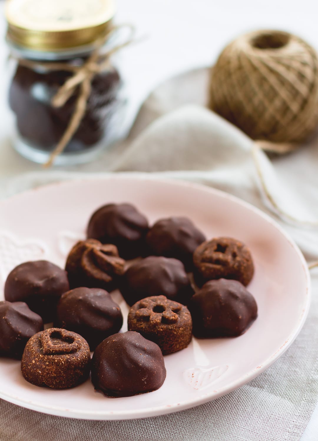 Raw Chocolate Covered Cookies - vegan and delicious, these chocolatey cookies are actually healthy! Great for Valentine's Day or any other day of the week when you're craving something sweet! Store them in the fridge or in the freezer. | thehealthfulideas.com