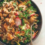 Cajun Roasted Cauliflower Salad - I love cajun seasoning on roasted fall vegetables. This salad is perfect for this time of the year. Cauliflower, mixed salad, and tahini dressing. (vegan, GF) | thehealthfulideas.com