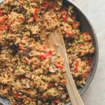 Loaded Veggie Fried Rice - the perfect comforting fall recipe. Made with brown rice, mushrooms, veggies, spices, and tamari almond butter dressing. (vegan, GF) | thehealthfulideas.com