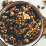 Orange Zest Granola with Dark Chocolate - delicious sweet zesty granola with melted cacao paste on top to create the best dark chocolate & orange flavor. Gluten-free, vegan, and sugar-free! You'll LOVE this granola! | thehealthfulideas.com