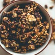 Orange Zest Granola with Dark Chocolate - delicious sweet zesty granola with melted cacao paste on top to create the best dark chocolate & orange flavor. Gluten-free, vegan, and sugar-free! You'll LOVE this granola! | thehealthfulideas.com