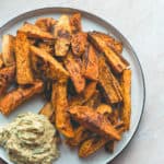 Tandoori Masala Sweet Potato Wedges (vegan, GF) - over roasted sweet potato fries with amazing spices, and a touch of coconut oil. Easy to make, delicious, and totally guilt-free. You'll love this recipe! | thehealthfulideas.com