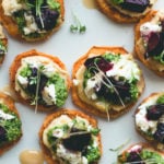 Sweet Potato Rounds with Hummus, Arugula Basil Pesto, Goat Cheese, Roasted Beets, Sprouts, and a drizzle of honey. Can be made vegan too! Gluten-free. | thehealthfulideas.com