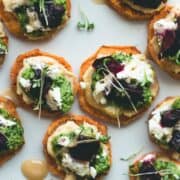 Sweet Potato Rounds with Hummus, Arugula Basil Pesto, Goat Cheese, Roasted Beets, Sprouts, and a drizzle of honey. Can be made vegan too! Gluten-free. | thehealthfulideas.com