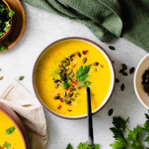 A square overhead shot of Butternut Squash Curry Soup with Red Lentils