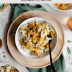 A vertical overhead shot of Butternut Squash Penne with Sage and Toasted Walnuts on a white plate