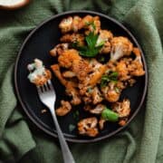 Overhead shot of Smoky Za’atar Roasted Cauliflower Florets with Yogurt Dip