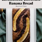 A photo of Caramelized Chocolate Banana Bread on a beige plate, green kitchen towel, and light wooden table.