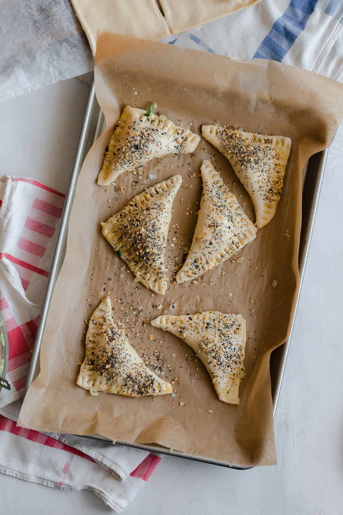 Unbaked Spinach and Feta Puff Pastry Triangles