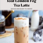 London Fog Tea Latte in a tall glass with frothy milk on top.