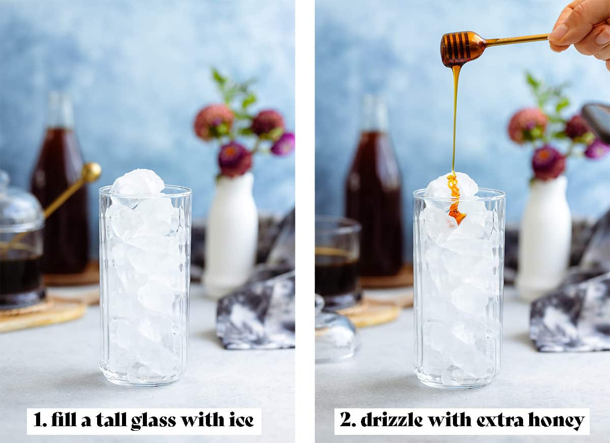 A tall glass filled with ice with a hand drizzling in honey.