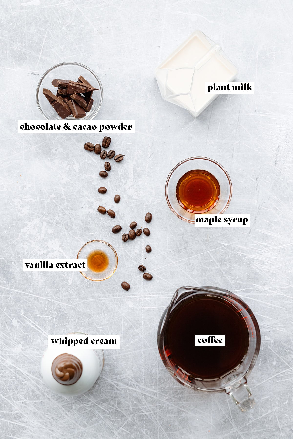 Ingredients needed to make a vegan iced mocha coffee.