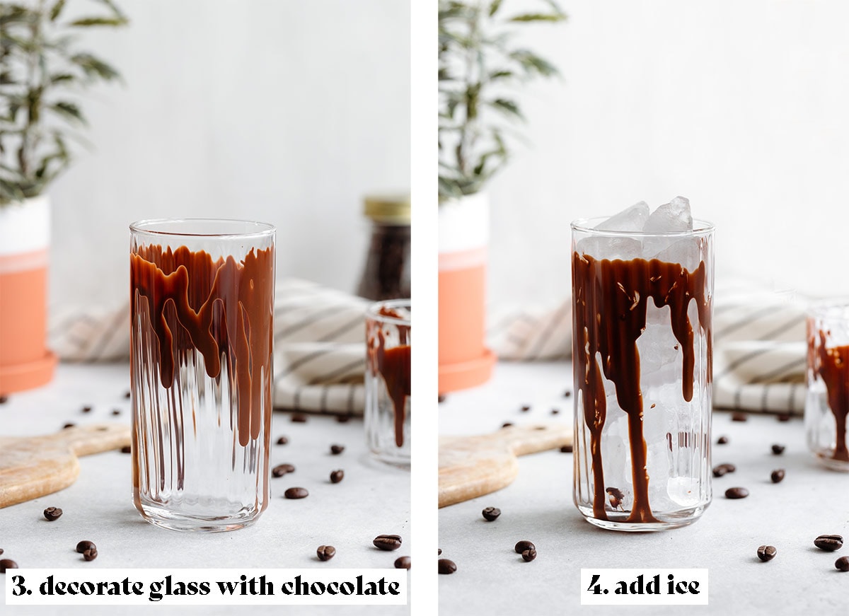 A tall glass drizzled with chocolate and filled with ice.