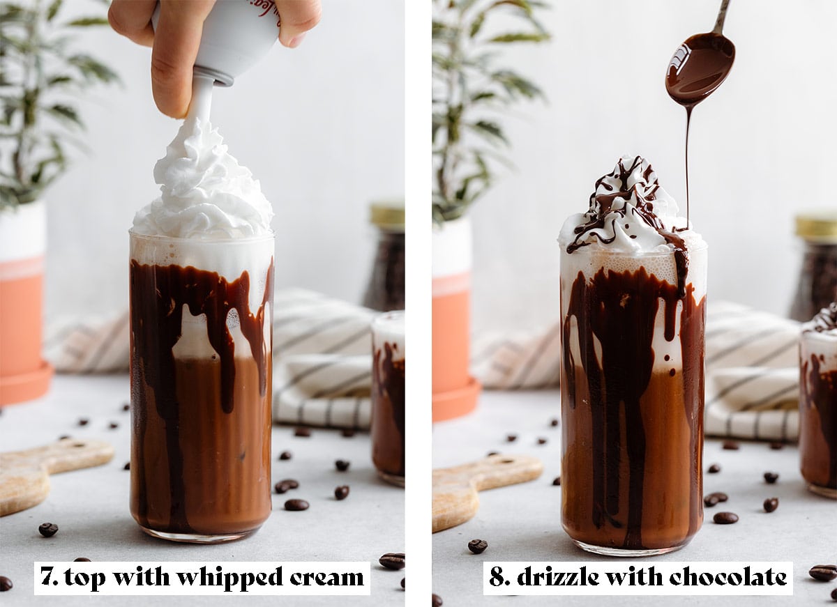 Iced mocha in a tall glass being topped with whipped cream and melted chocolate.