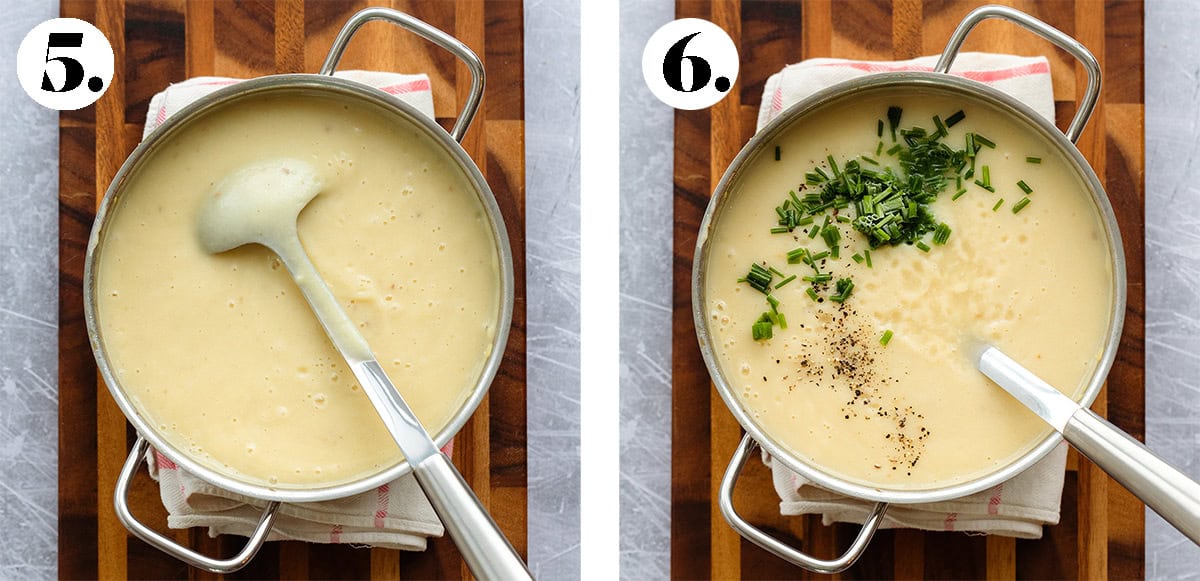 Cream of cauliflower soup in a pot all blended and with herbs and pepper.