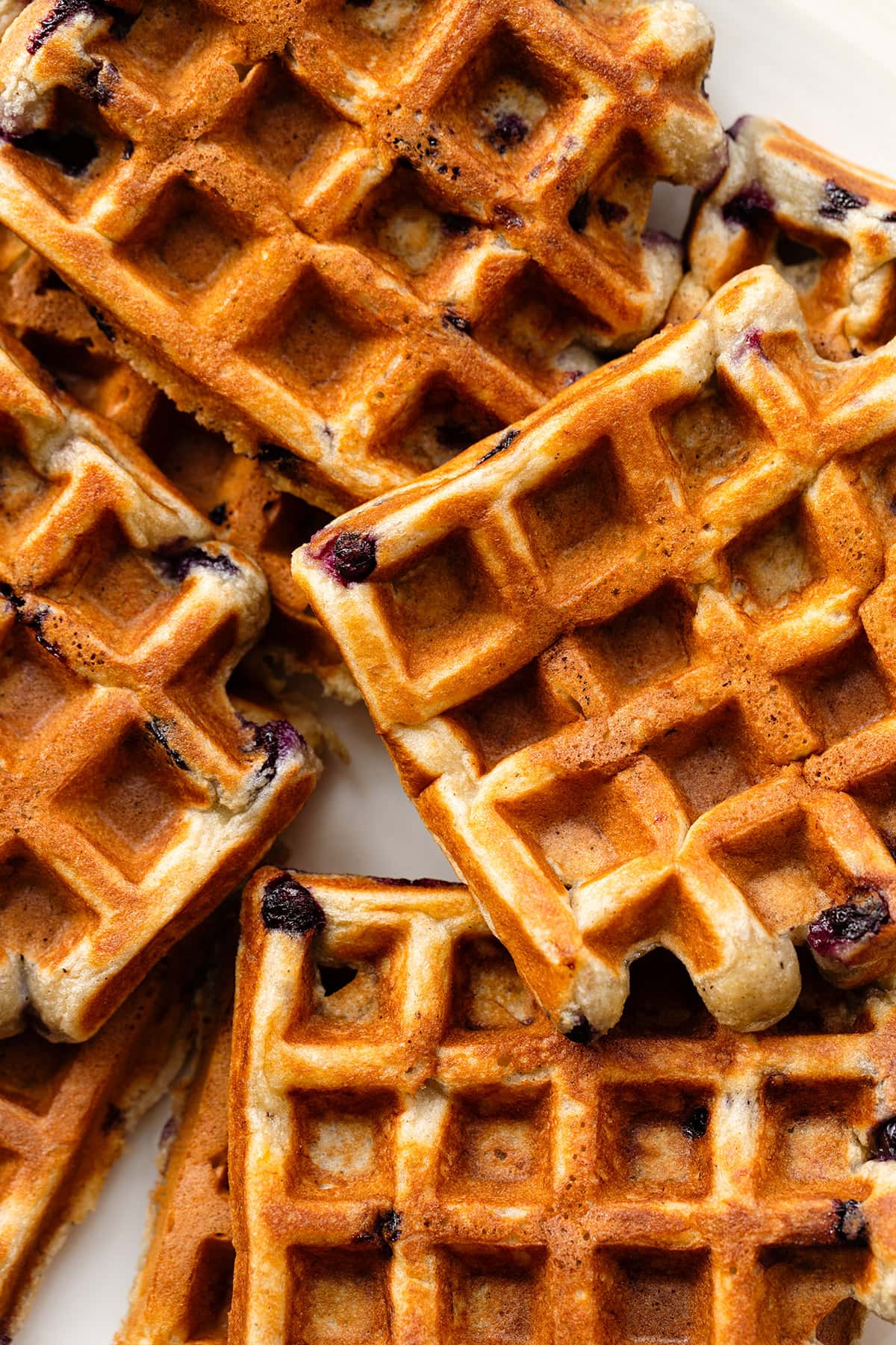 Close up of belgian waffles with blueberries.