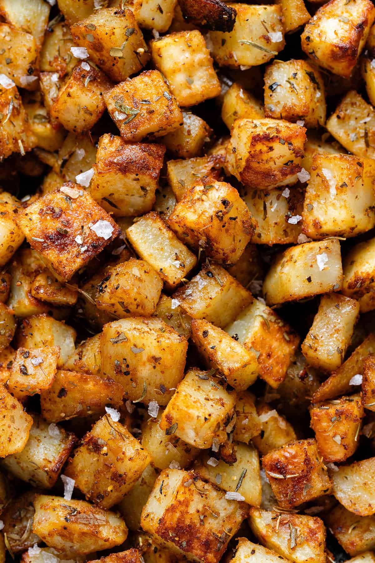 Roasted crispy potatoes with flaked sea salt.