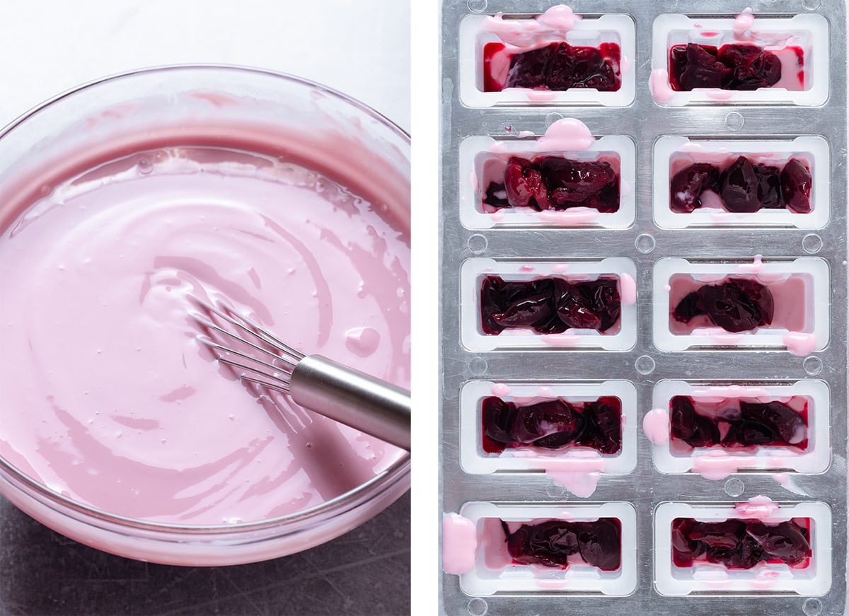 Thick yogurt made pink from cherry syrup in a glass bowl and popsicle molds filled with the pink yogurt and cherries.