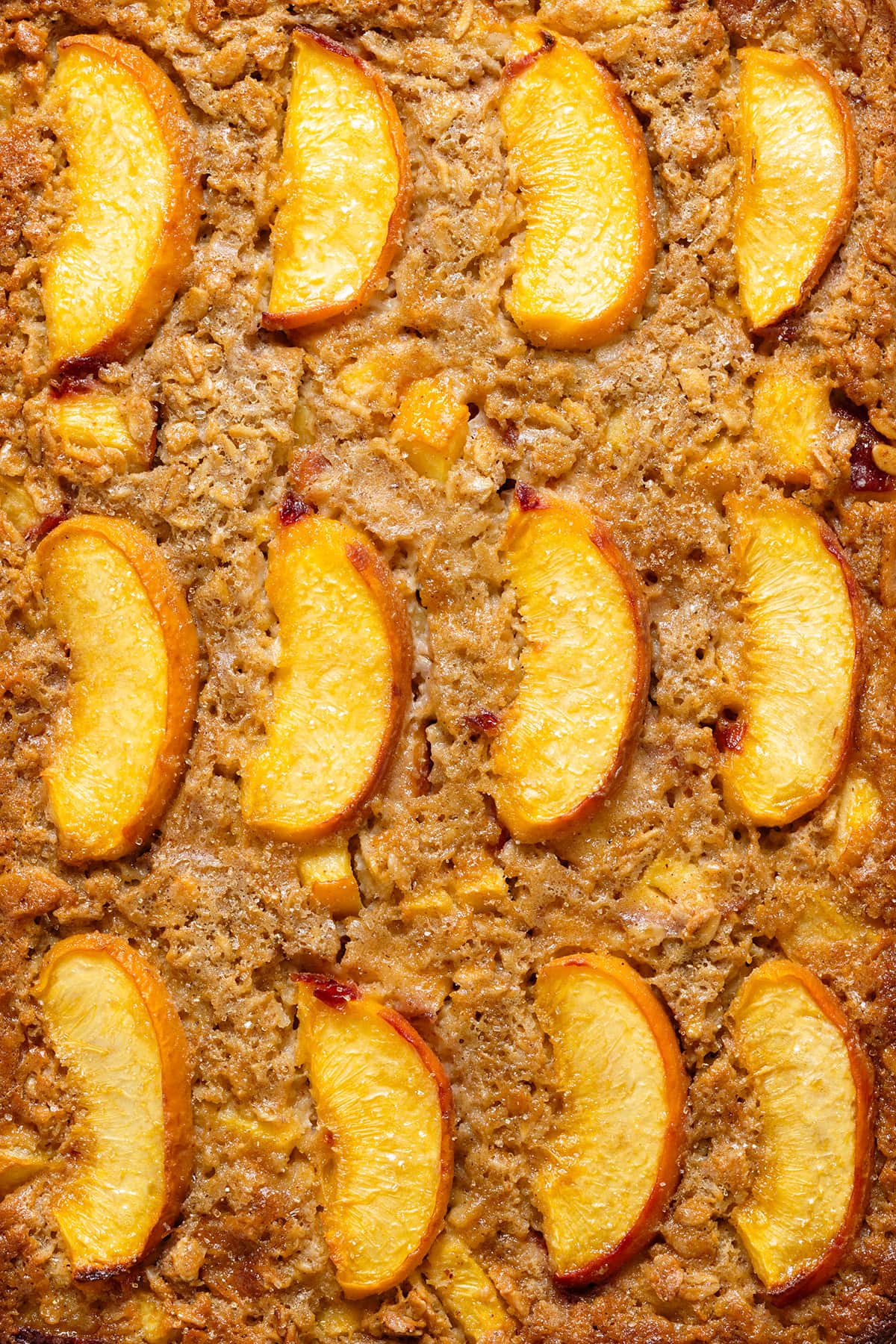 Baked oatmeal with caramelized peaches on top.
