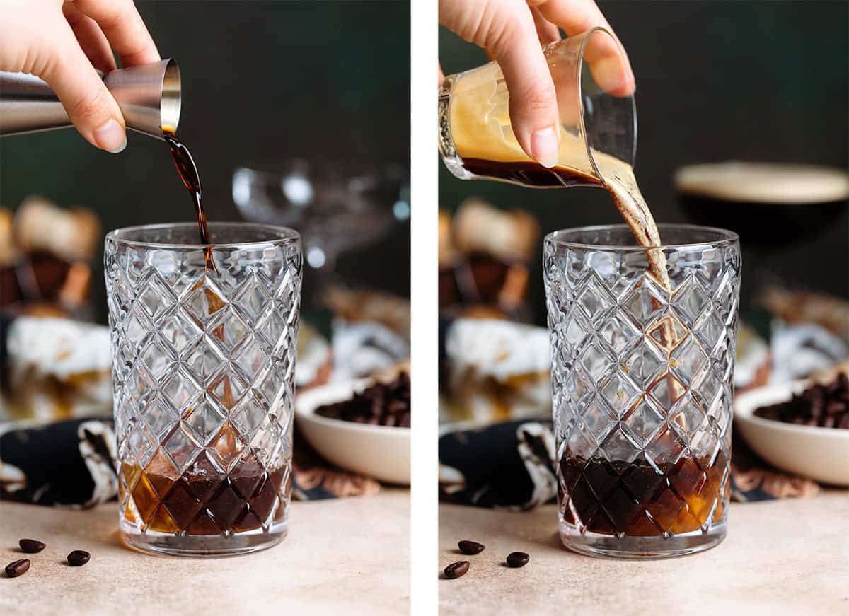 Kahlua and espresso being poured into a glass cocktail shaker with a dark green backdrop.