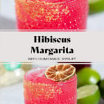 Bright pink margarita in a short glass garnished with a dehydrated lime slice.