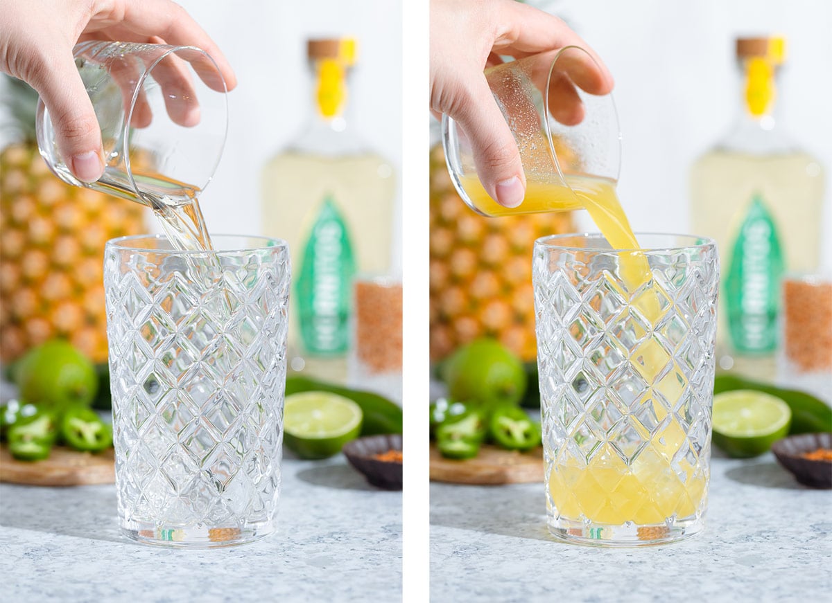 Tequila and pineapple juice being poured into a glass cocktail shaker.