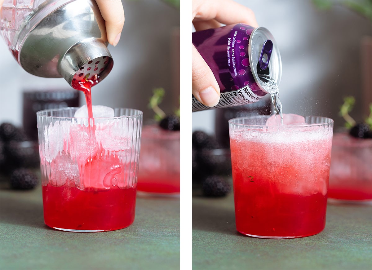 Bright red drink being poured over ice into a short glass and being topped with a seltzer.