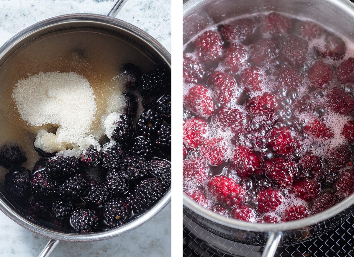 Blackberries simmering with sugar and water in a small pot.