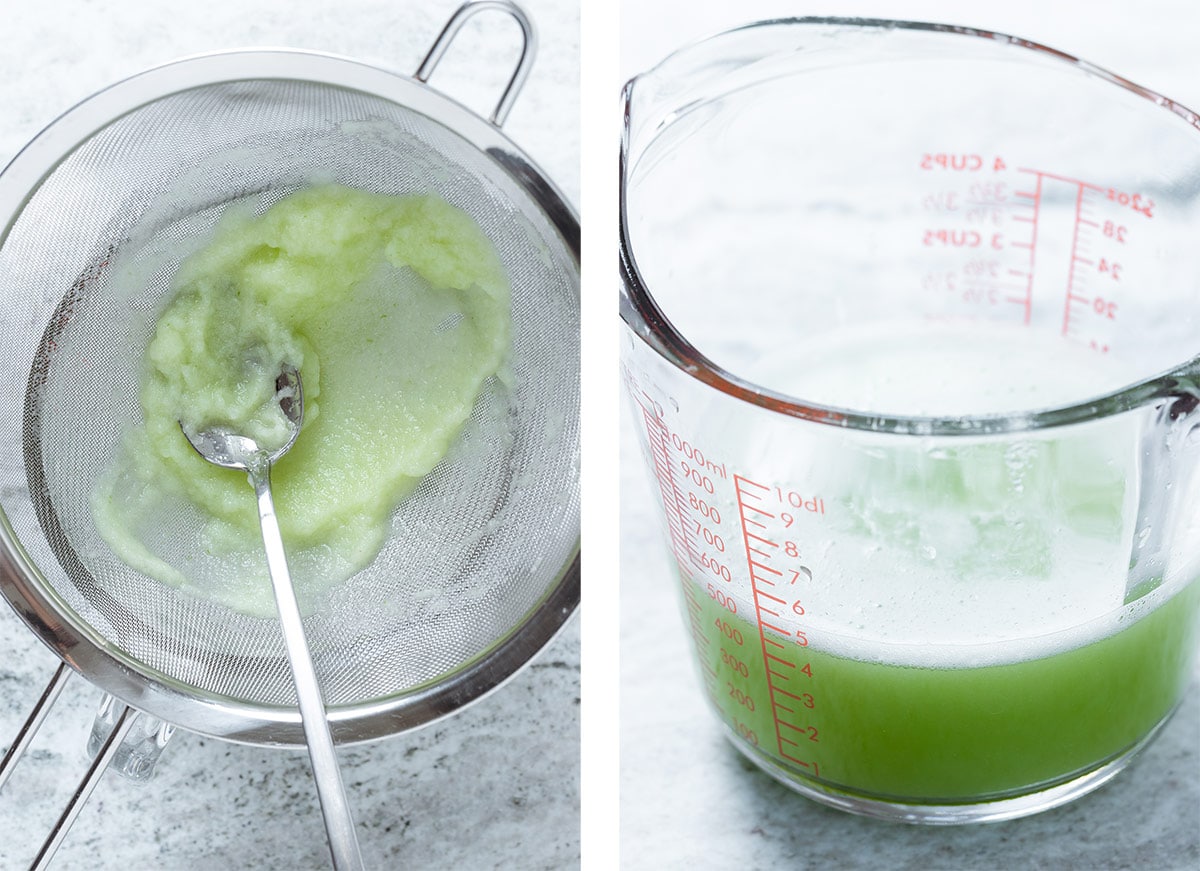 Blended cucumber being strained through a fine mesh strainer into a large measuring cup.