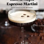 Espresso martini in a coupe glass with a layer of foam on top garnished with three coffee beans.