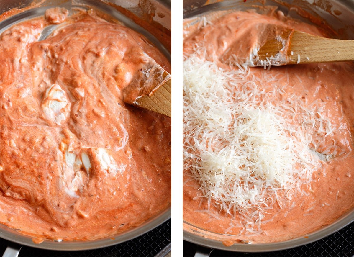 Creamy tomato goat cheese sauce simmering in a large stainless steel pan with grated parmesan being stirred in.