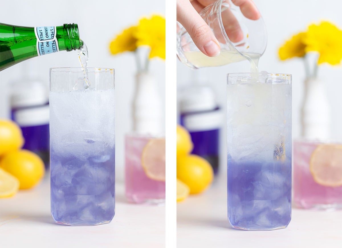 A blue cocktail with ice being topped up with sparking water and lemon juice.