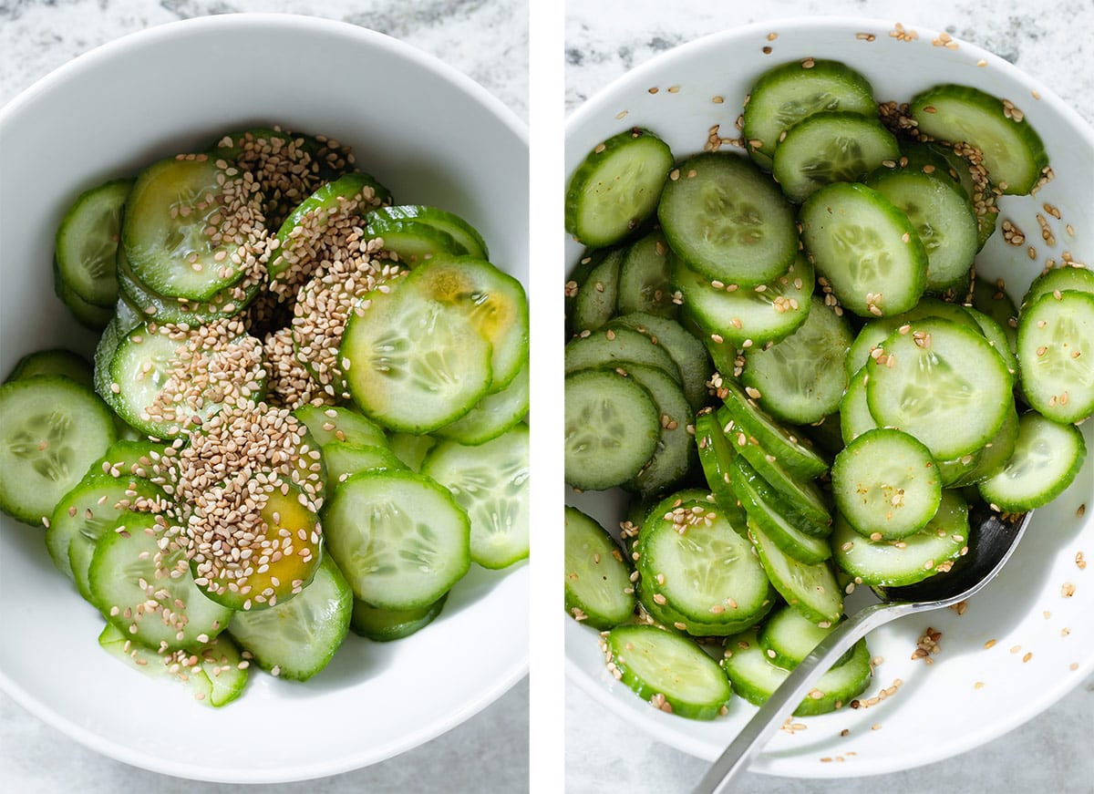 Cucumber salad with toasted sesame seeds and sesame oil being mixed in a small white bowl.