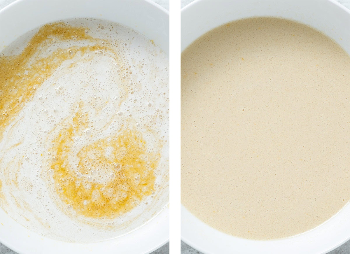 Milk being whisked into other wet ingredients in a white bowl.