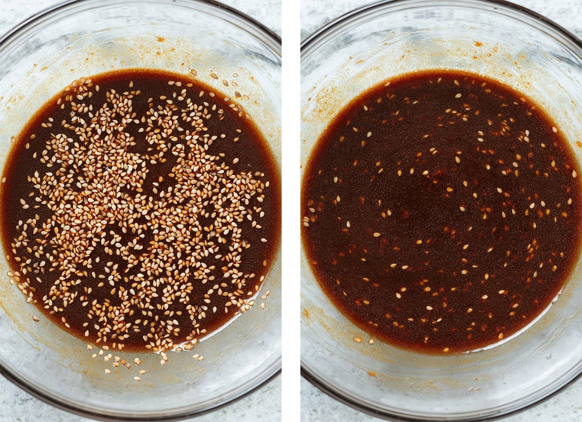 Dark sesame soy sauce dressing with lots of sesame seeds in a medium glass bowl.