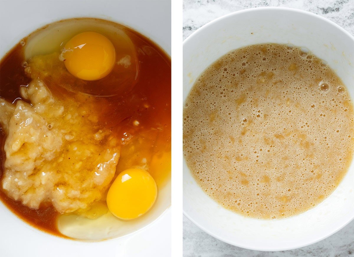 Eggs, mashed bananas, honey, and other ingredients being whisked together in a white bowl.