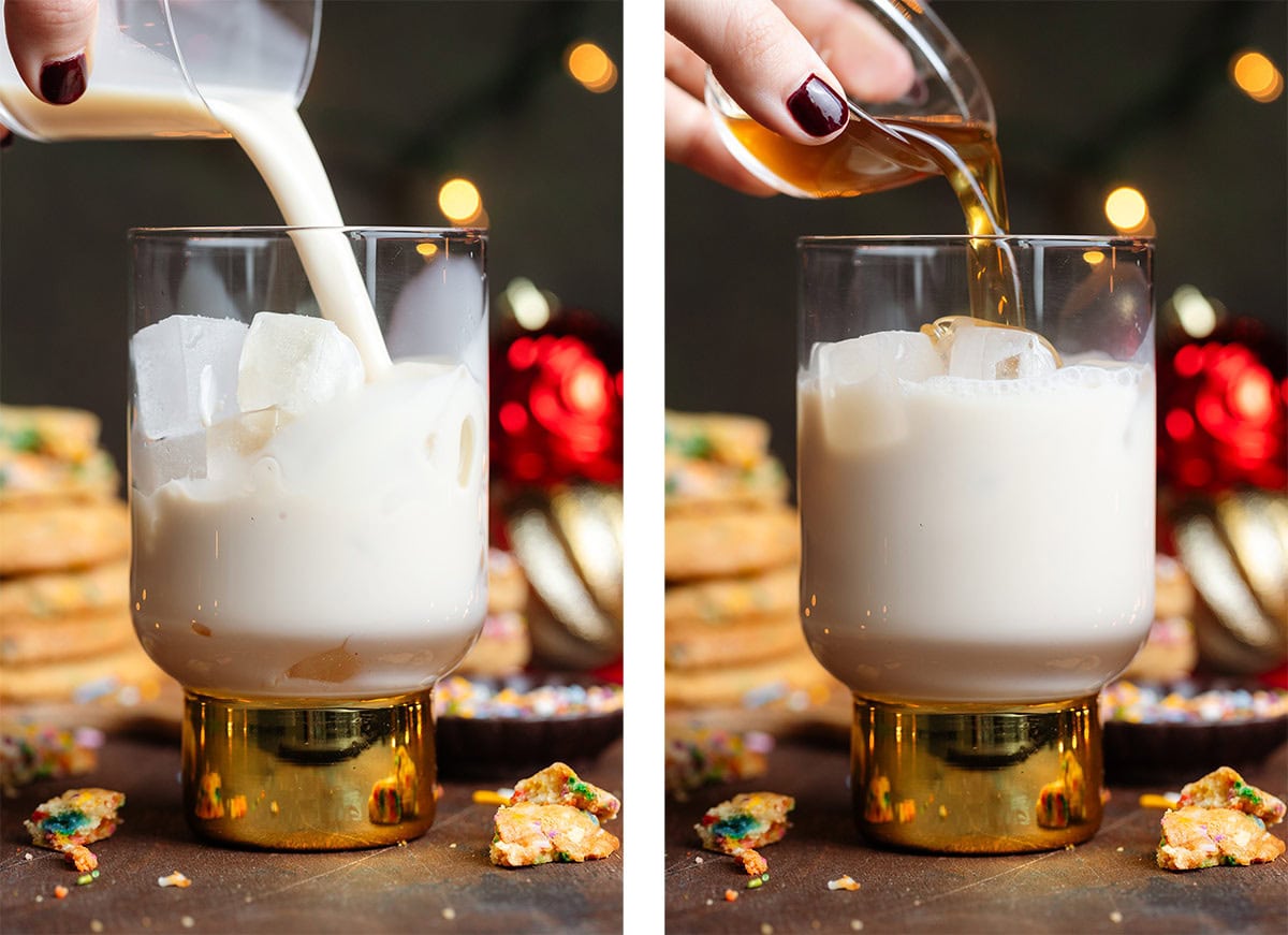 Milk and syrup being poured over ice into a tall glass with a thick gold stem.