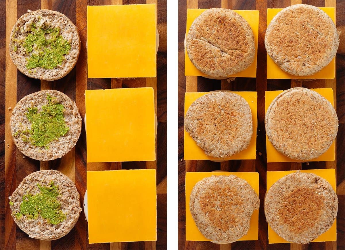 Cheddar cheese added to breakfast sandwiches and the sandwiches being closed with the other half of the English muffin.