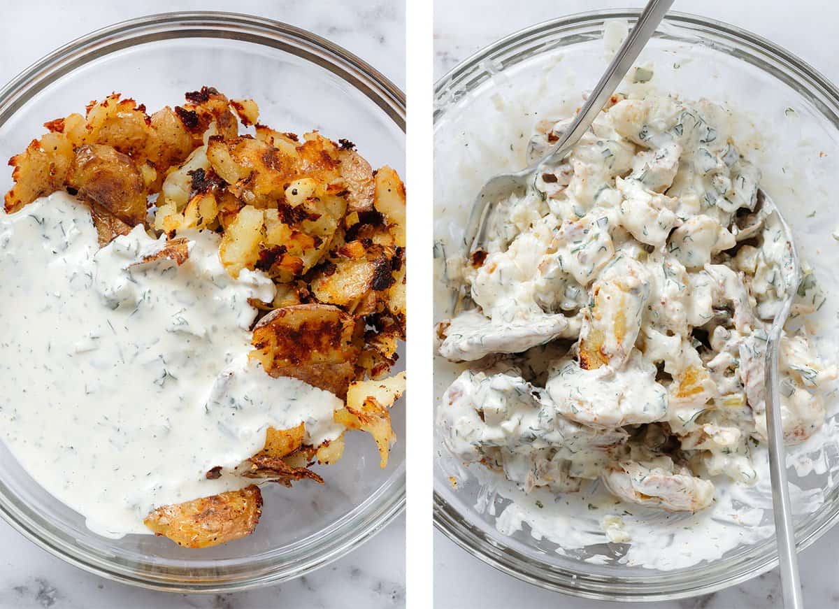 Crispy potatoes tossed with yogurt dressing in a glass bowl.